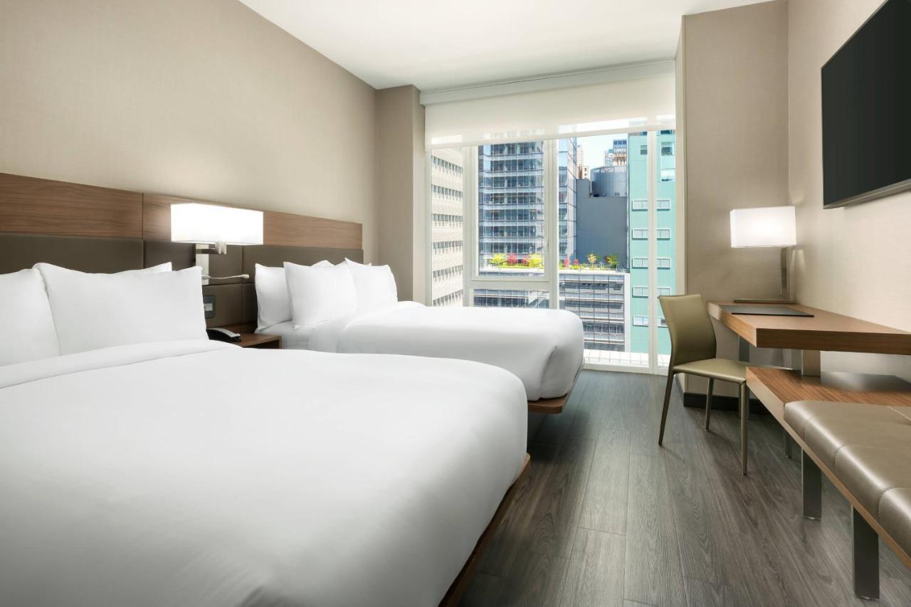Double Room with Two Double Beds and City View,695576142:JPEG